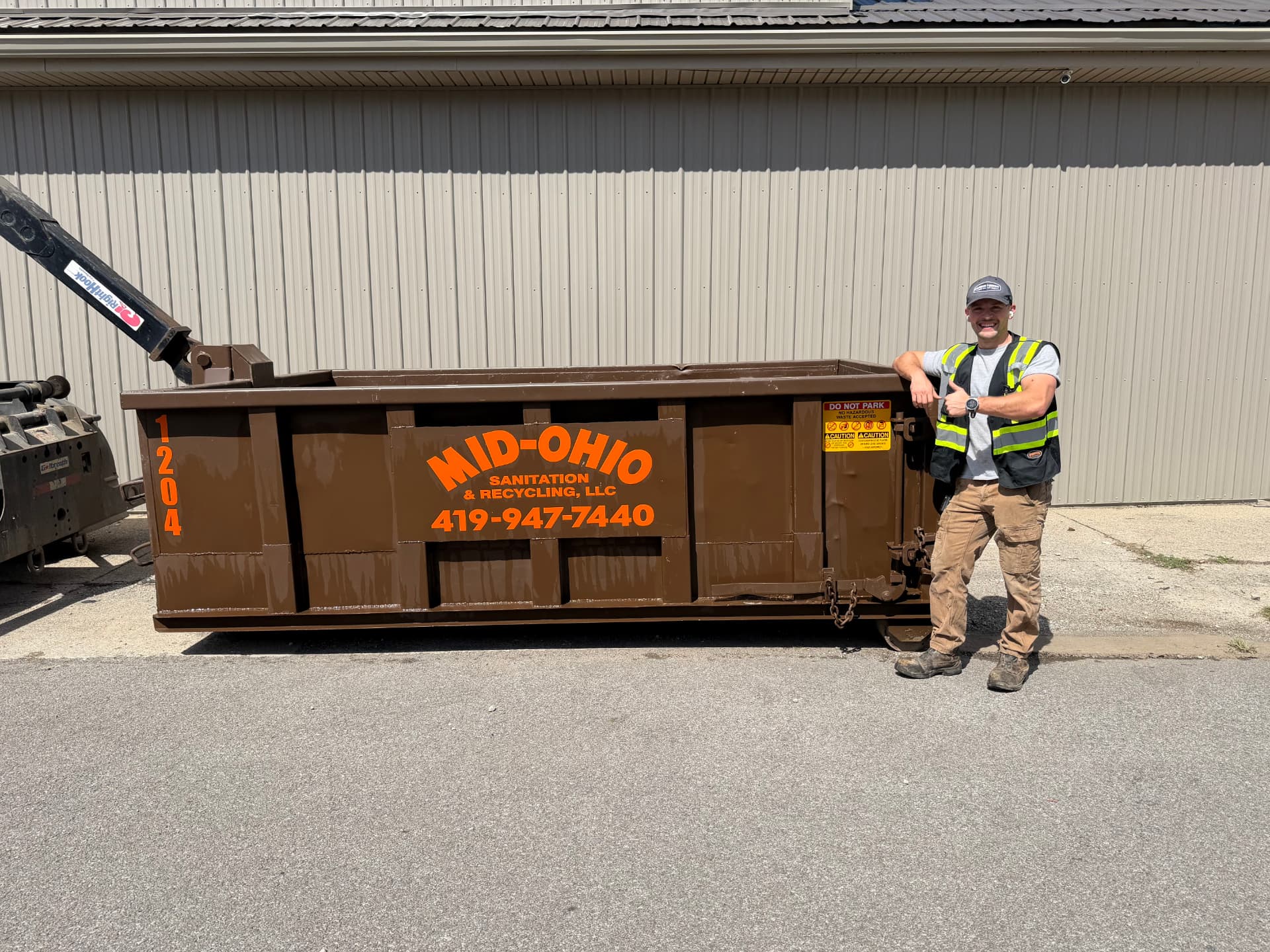 12 Yard Mid-Ohio Sanitation roll-off dumpster