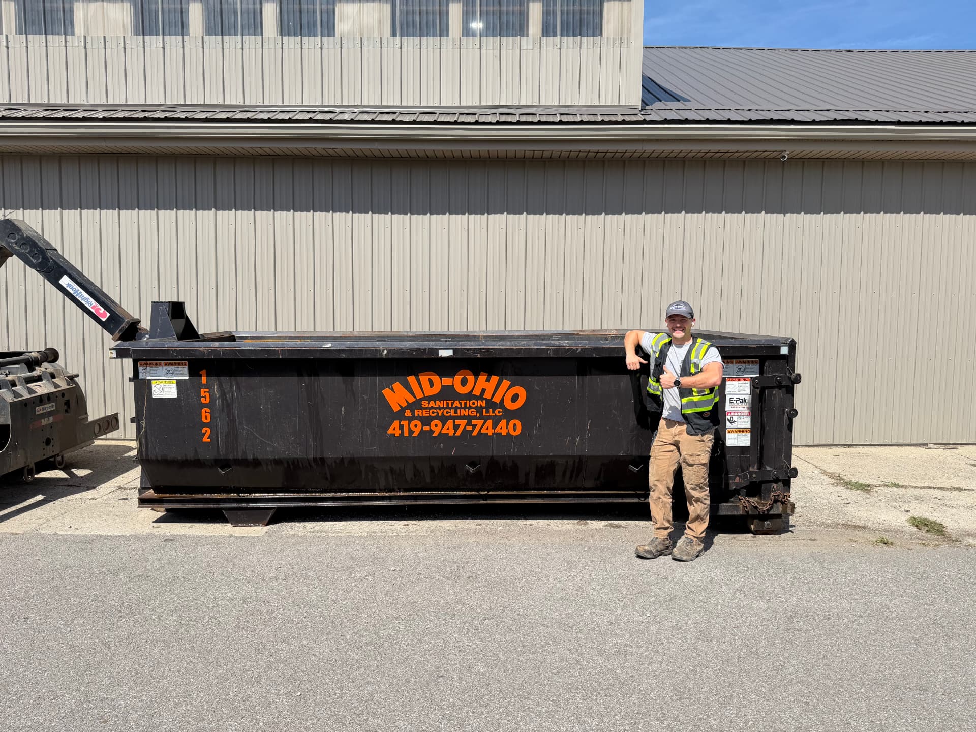 15 Yard Mid-Ohio Sanitation roll-off dumpster